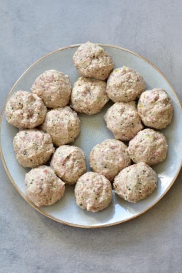 shaped ricotta meatballs on a plate