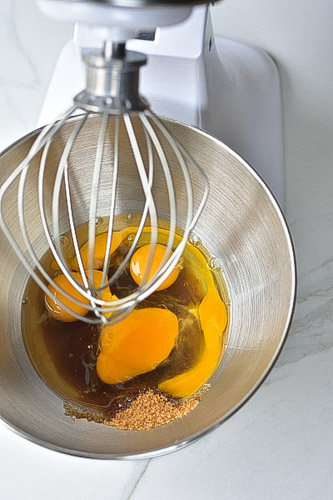 eggs and sugar in a stand mixer bowl