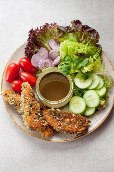 All ingredients needed to prepare pumpkin seed crusted chicken salad