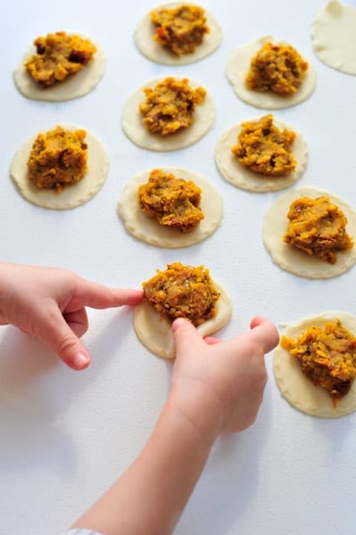 placing the filling over the pierogi dough rounds