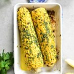 oven-roasted corn on a cob with herb chili butter