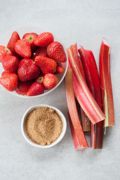 ingredients for the galette filling: strawberries, rhubarb and sugar