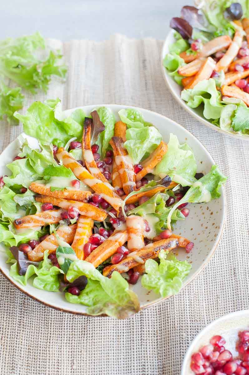 Roasted carrot salad with pomegranate and peanut butter lemon dressing