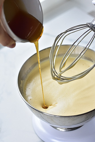 honey-vanilla extract mixture is being added to the batter