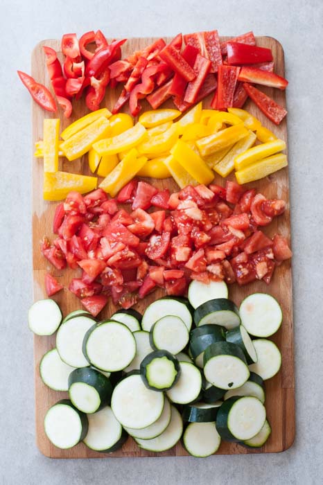 chopped vegetables for ratatouille on a chopping board