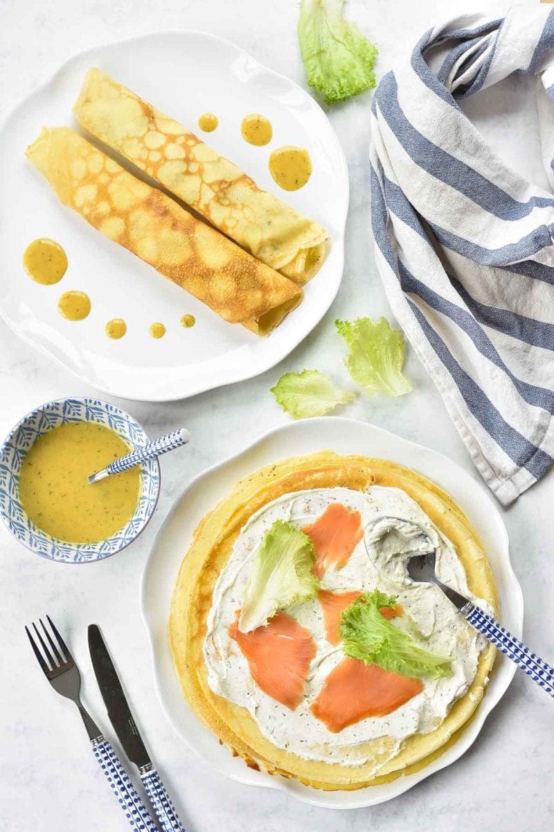 Smoked salmon crepes with herbed cream cheese and honey mustard sauce.