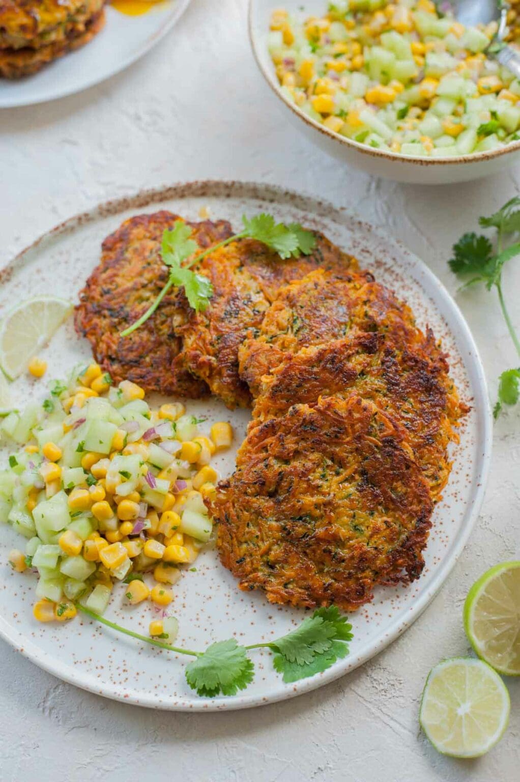 Sweet potato zucchini fritters with cucumber corn salsa