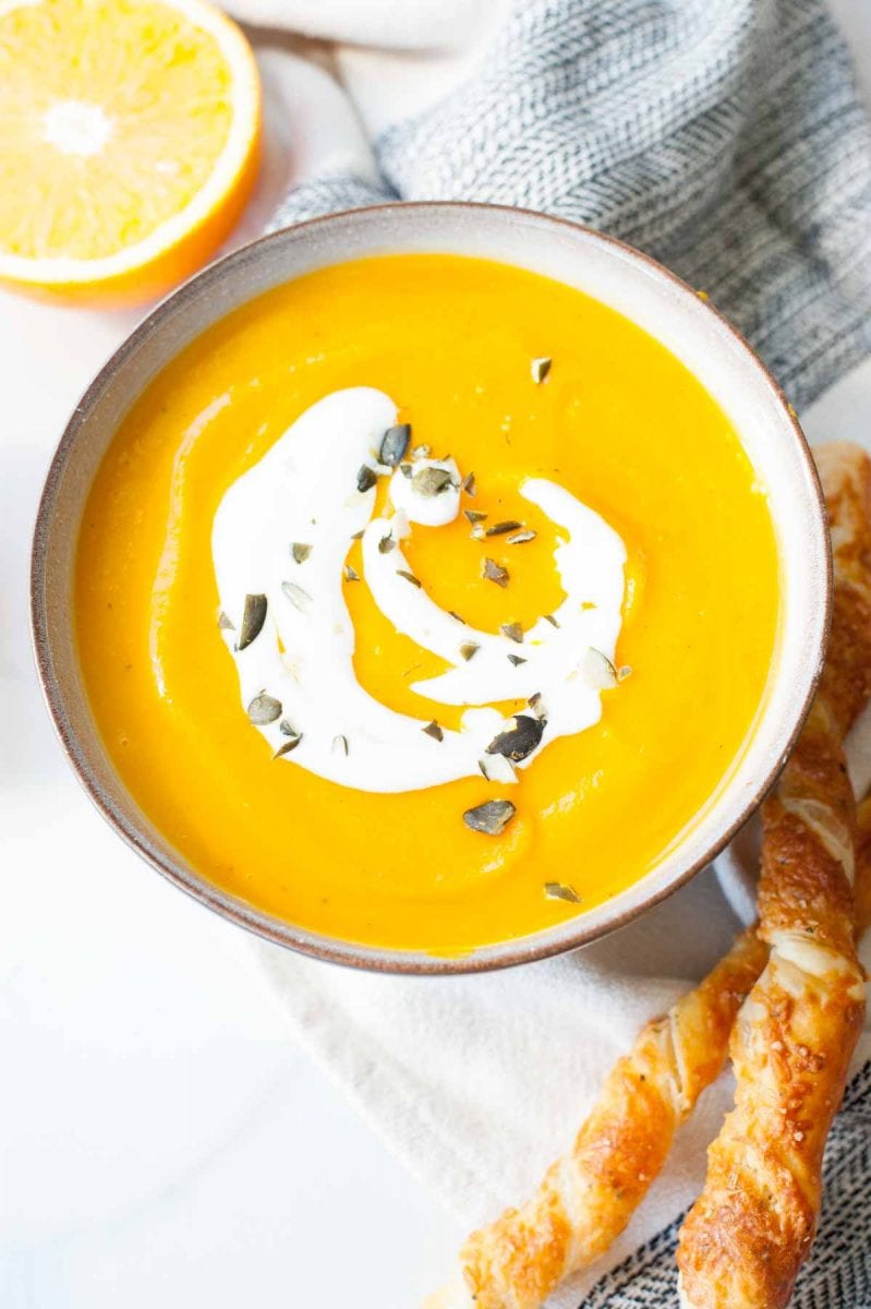 Pumpkin and ginger soup with orange in a bowl