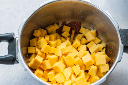 cubed pumpkin in a pot