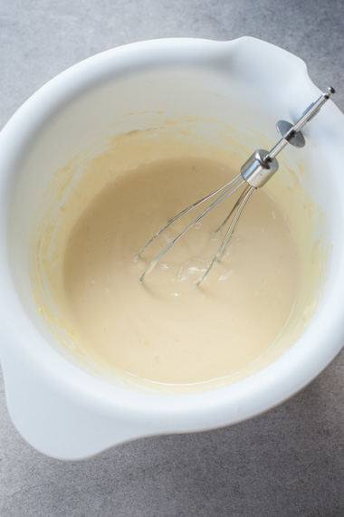 wet ingredients for lemon ricotta pancakes in a bowl