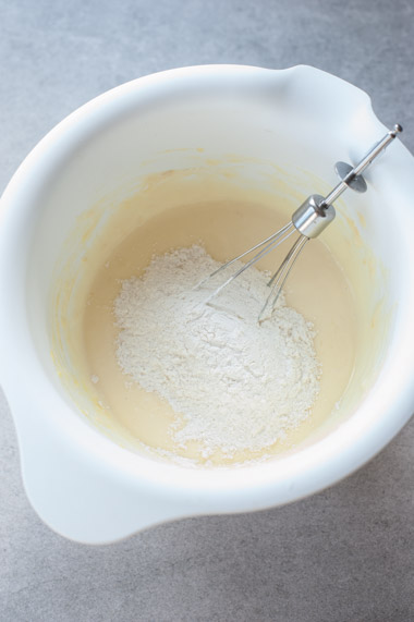 dry ingredients added to wet ingredients in a bowl