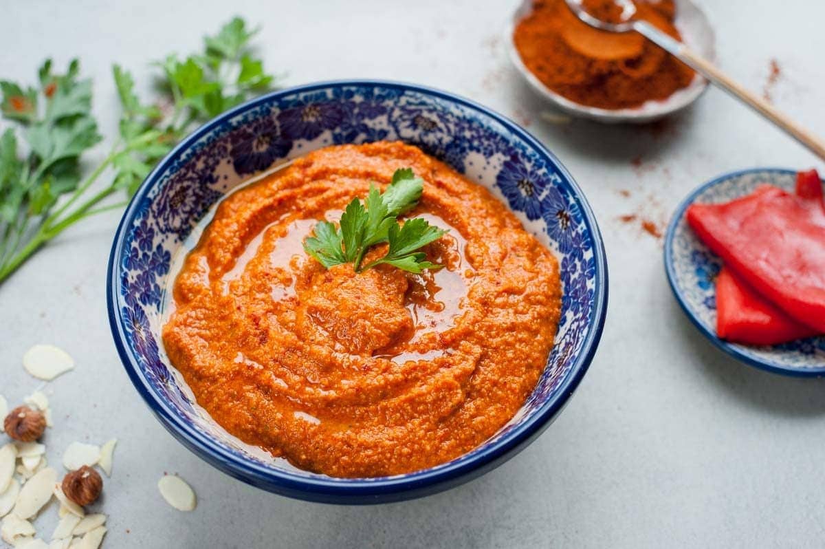 romesco sauce in a blue bowl