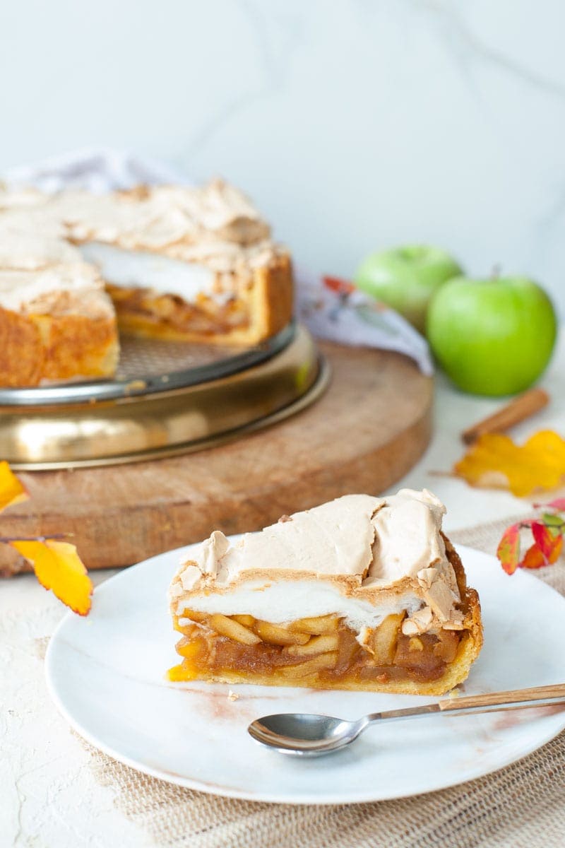 Apple tart with meringue topping on a plate