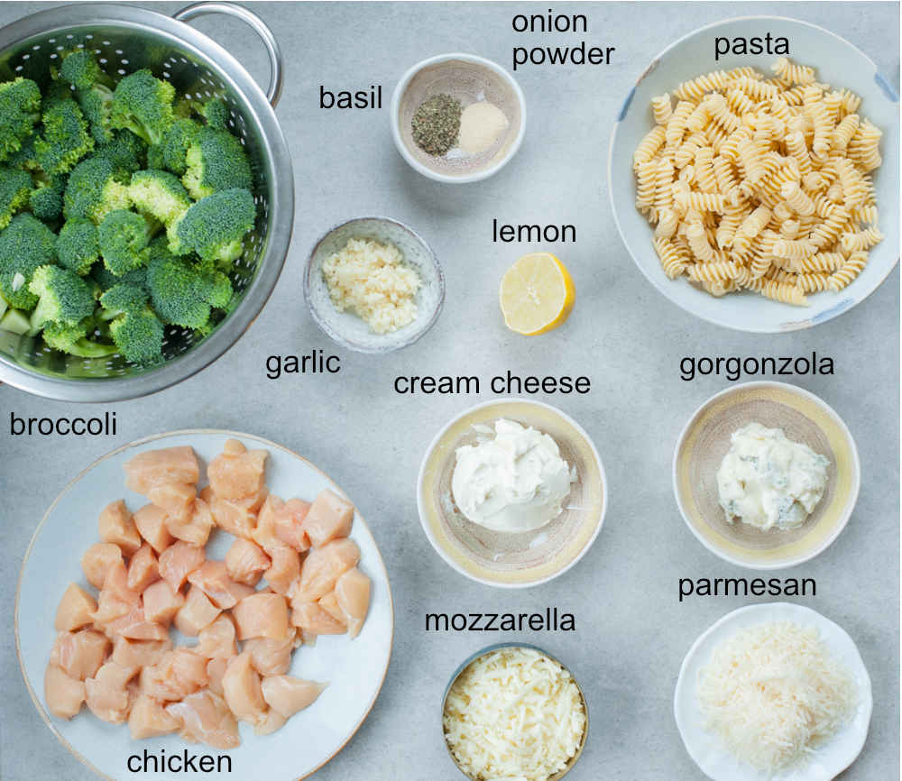 Labeled ingredients for four cheese pasta with chicken and broccoli.