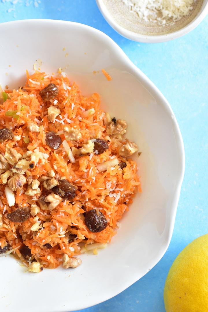 close up shot on shredded carrot apple salad