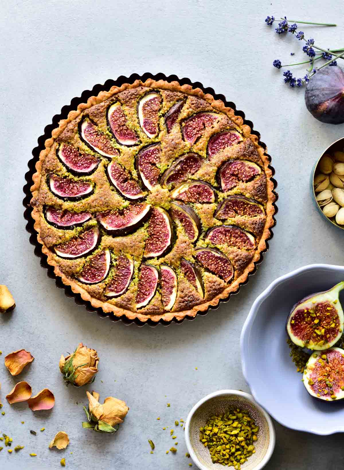 Fig tart with pistachio frangipane, figs and pistachios on the side