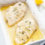 lemon thyme chicken in a white baking dish