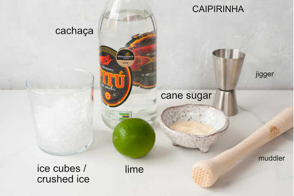 Labeled ingredients and equipment needed to prepare caipirinha.