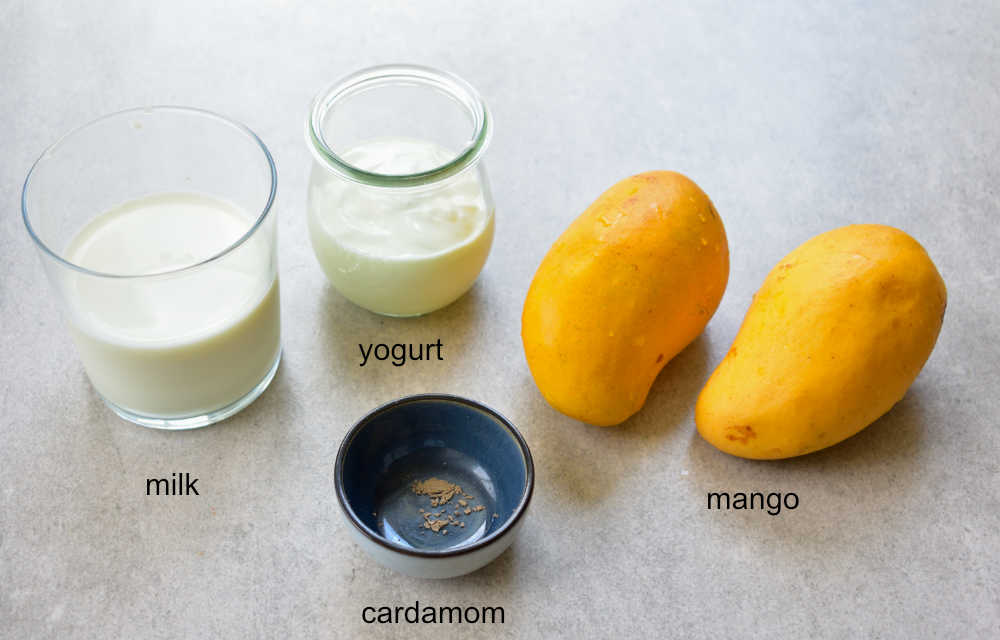 Labeled ingredients needed to prepare mango lassi.