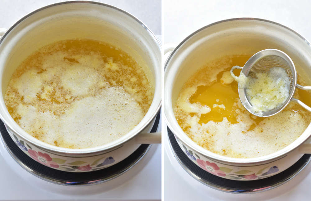 Milk solid on the surface of clarified butter are being scooped with a small sieve.