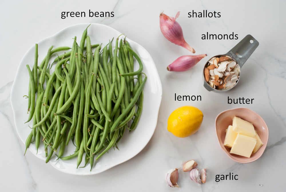 labeled ingredients needed to prepare green beans almondine