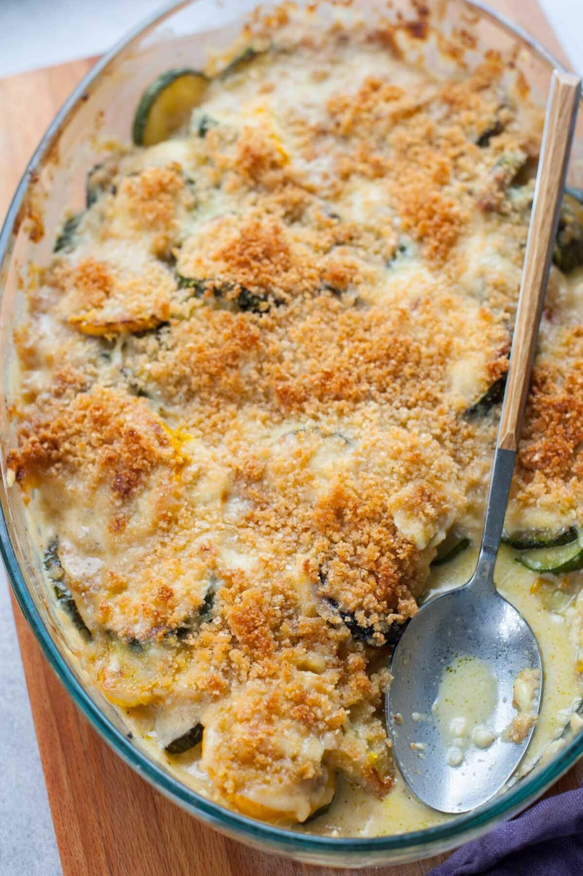 close up picture of zucchini gratin in a baking dish