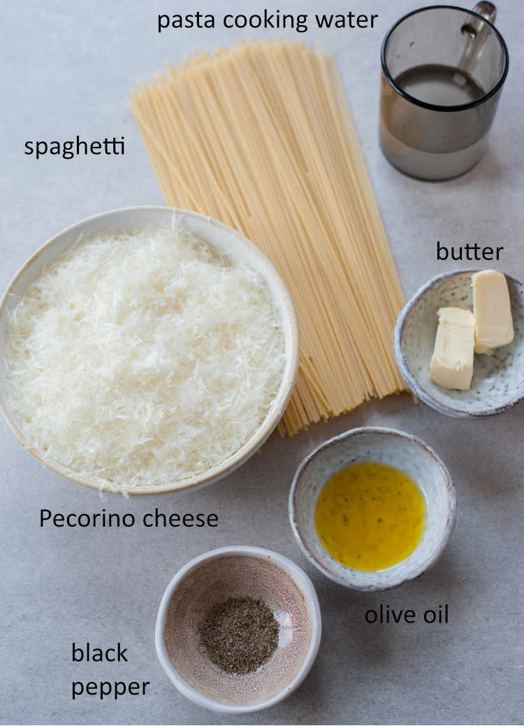 Ingredients needed to prepare spaghetti cacio e pepe.