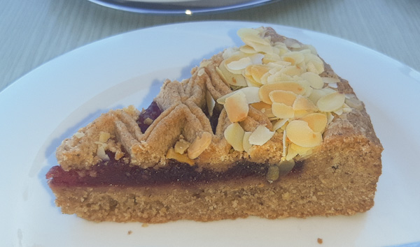 A picture of Linzer Torte on a white plate.