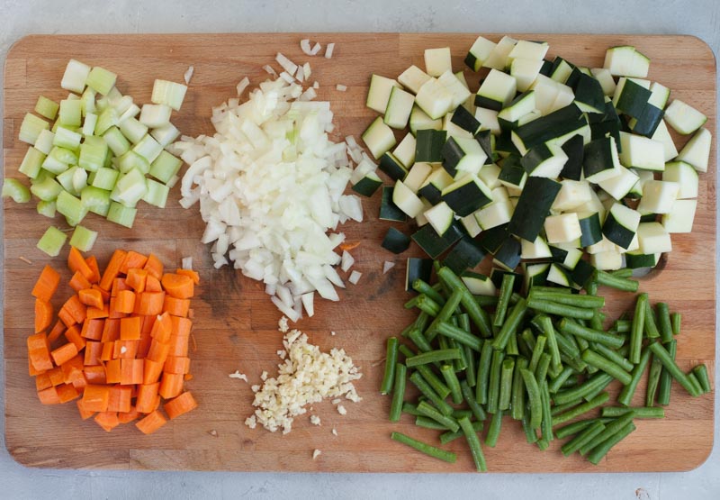 Chopped vegetables on a chopping board.