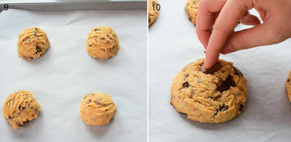 Ready to be baked cookies on a baking sheet. Chocolate chunks are being pressed into baked cookies.