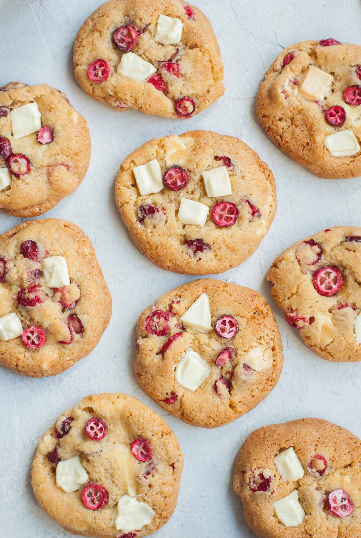 Fresh cranberry white chocolate cookies on a table.