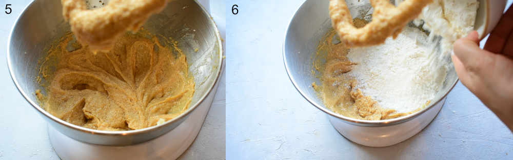 Creamed vanilla, egg, butter, and sugar in a metal bowl. Flour is being added to the bowl.