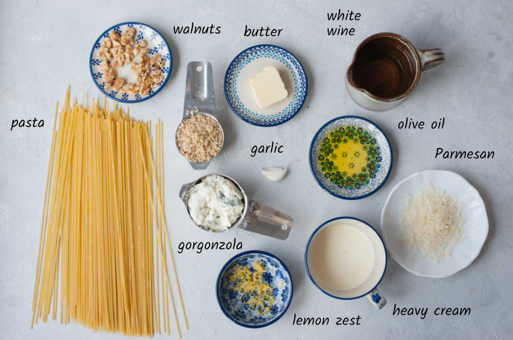 Labeled ingredients needed to prepare gorgonzola walnut pasta.