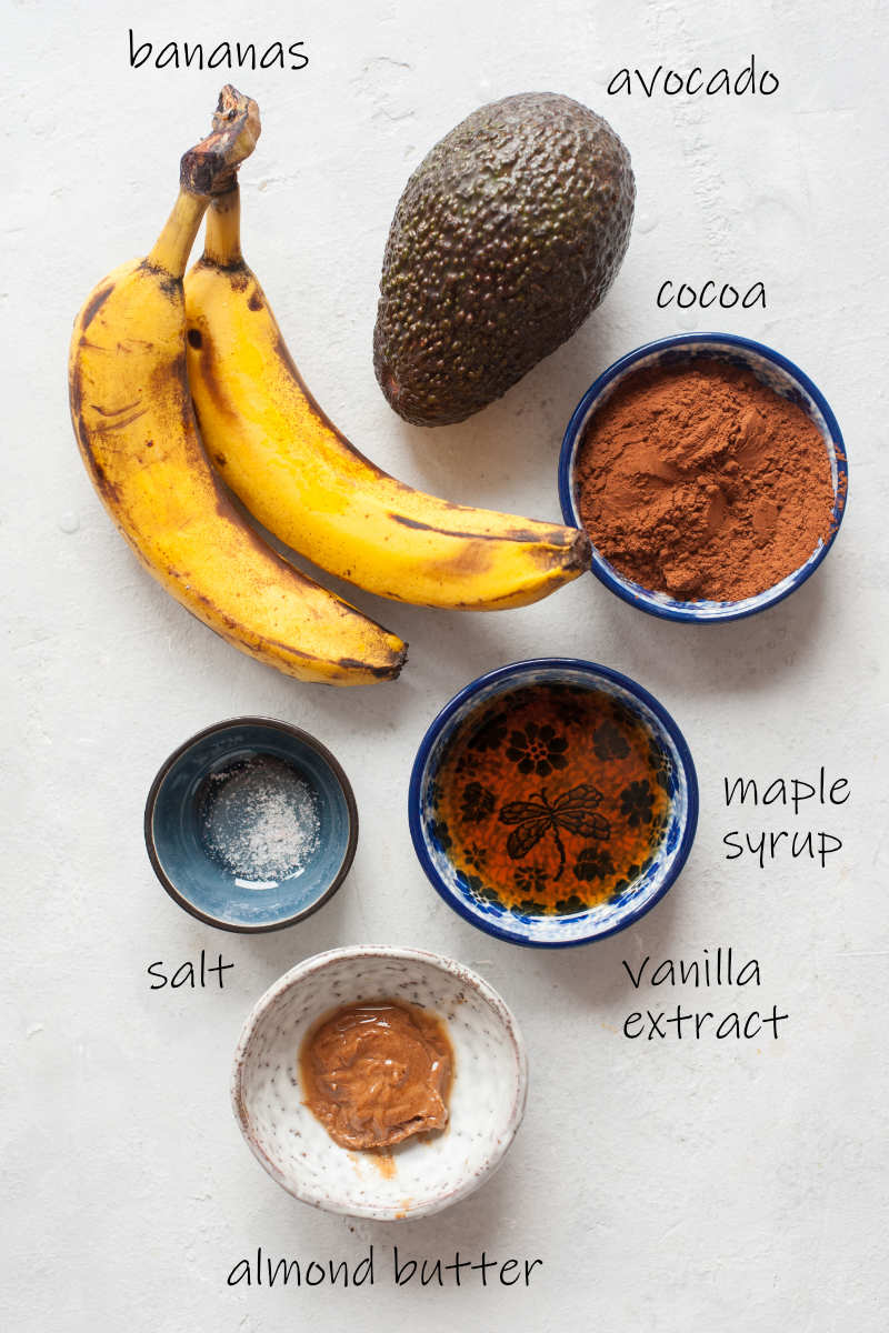 Labeled ingredients needed to prepare healthy chocolate pudding.