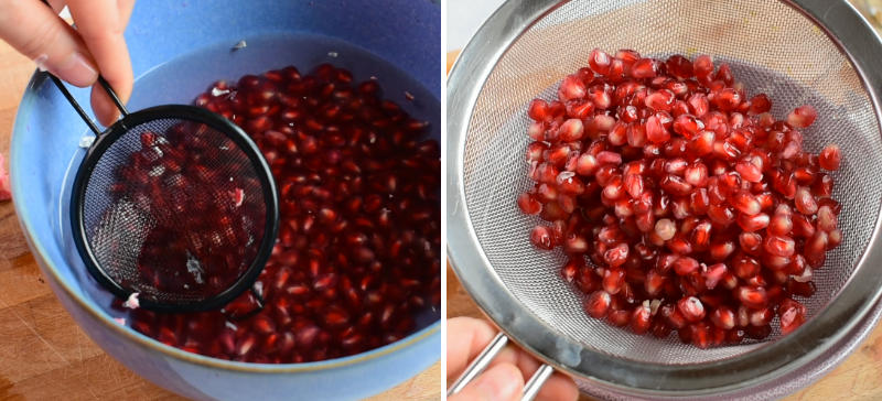 White membranes are being discarded with a sieve. Pomegranate seed son a sieve.