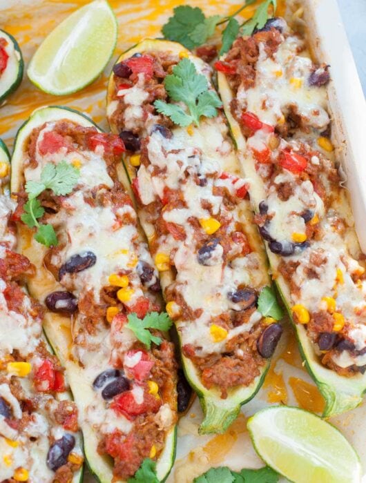 Mexican zucchini boats on a baking tray.