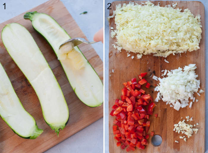 The center of a zucchini is being scooped out. Chopped vegetables on a chopping board.