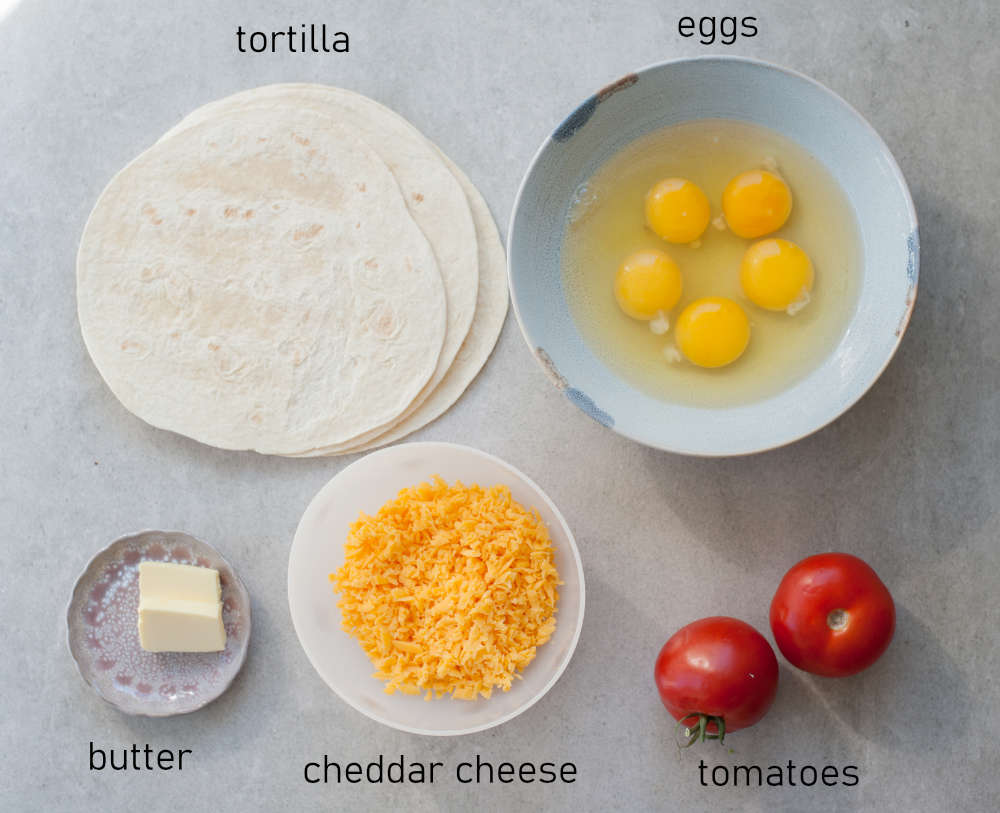 Labeled ingredients for breakfast quesadillas.