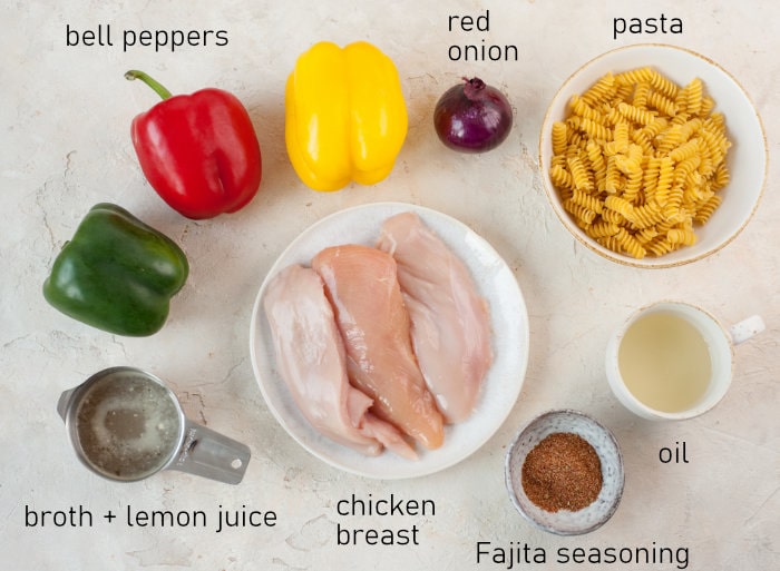 Labeled ingredients for chicken fajita pasta.