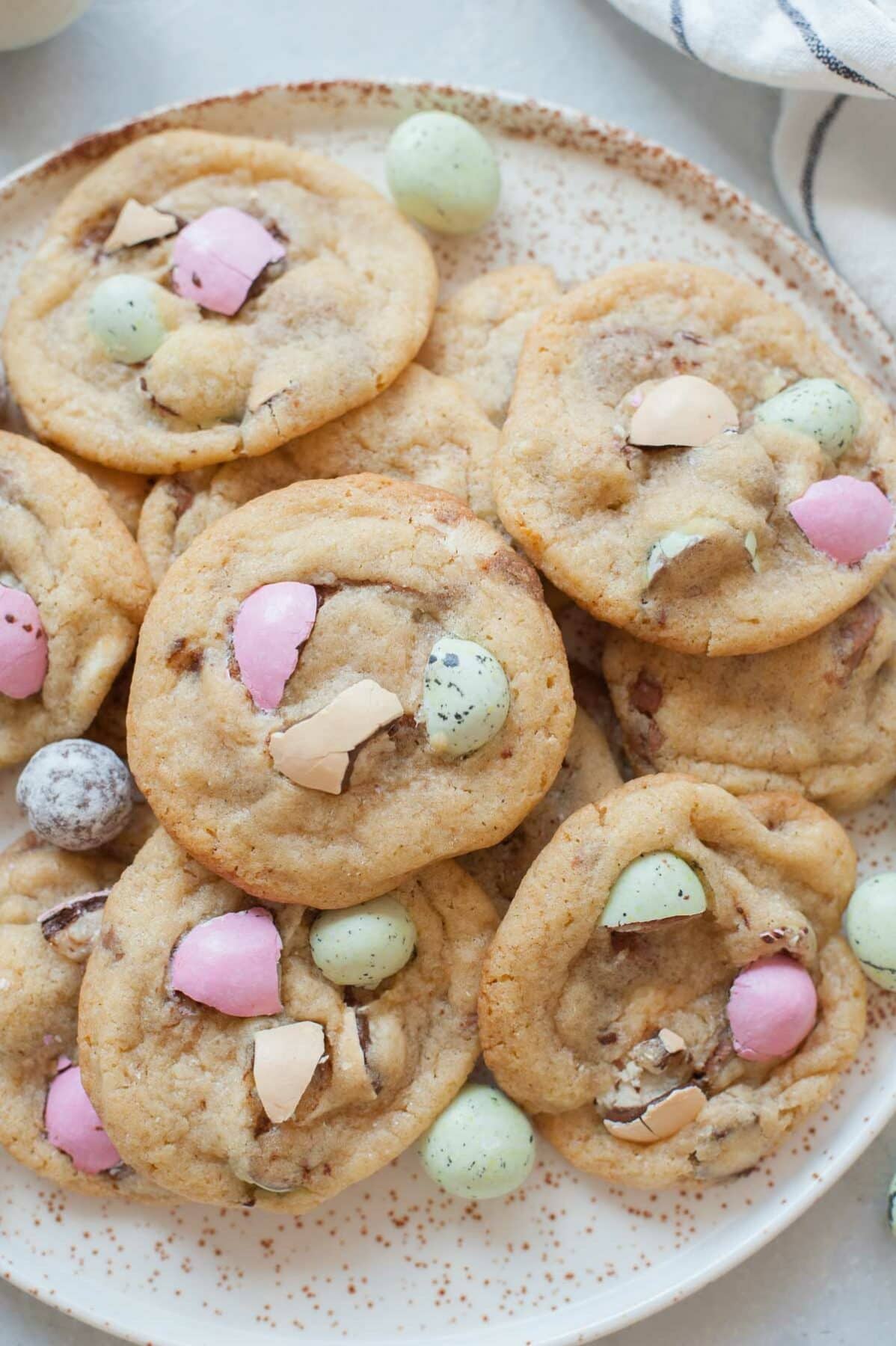 Easter candy cookies on a white plate.