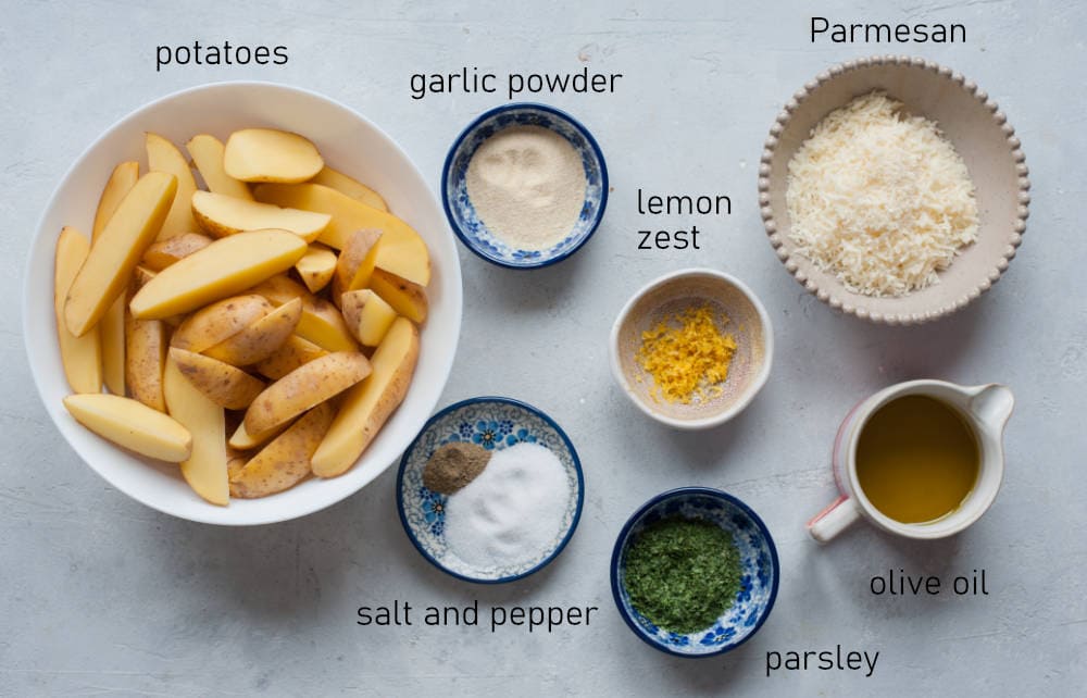 Labeled ingredients for parmesan lemon parsley potato wedges.