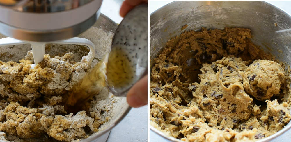 Bourbon is being added to a bowl with cookie batter. Chocolate chip cookie batter in a bowl.