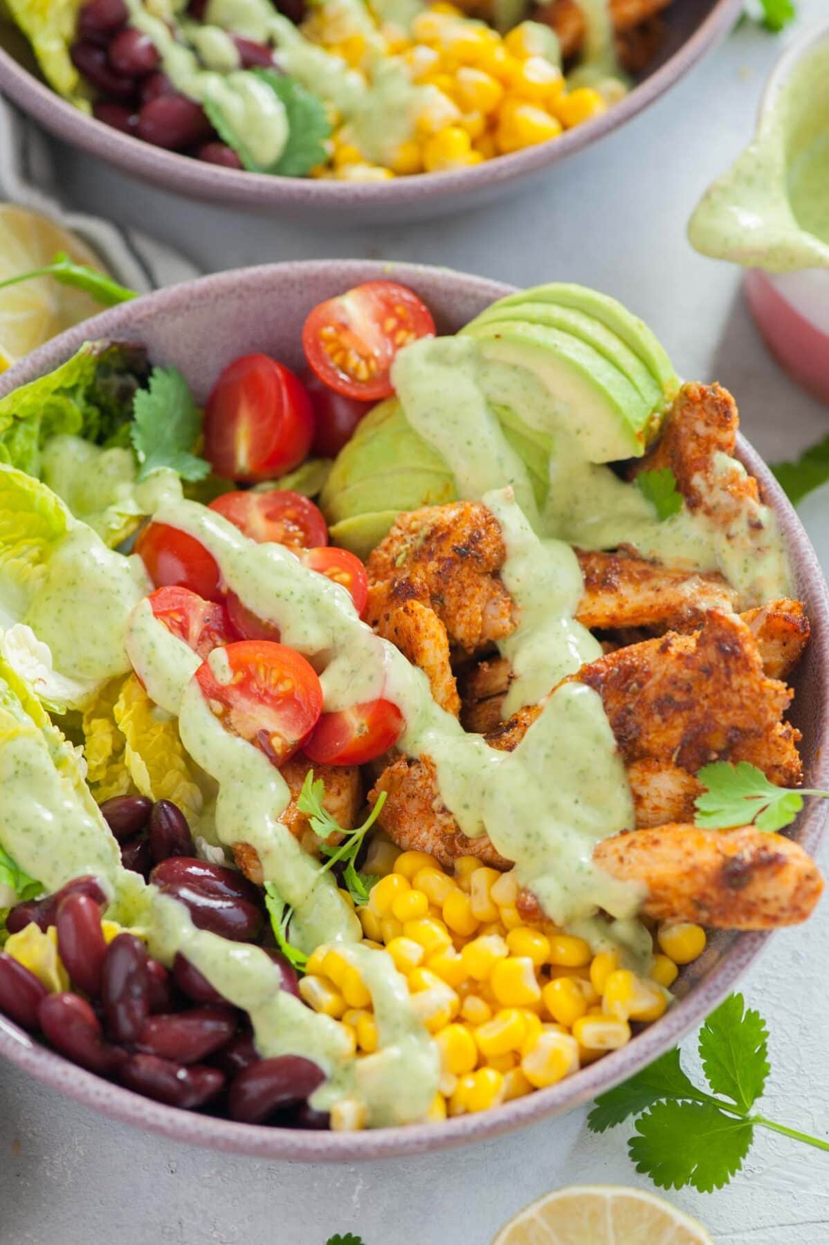 Southwest chicken salad in a violet bowl.