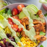 Southwest chicken salad in a violet bowl.