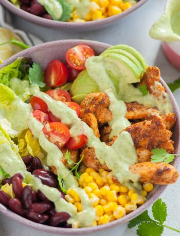 Southwest chicken salad in a violet bowl.