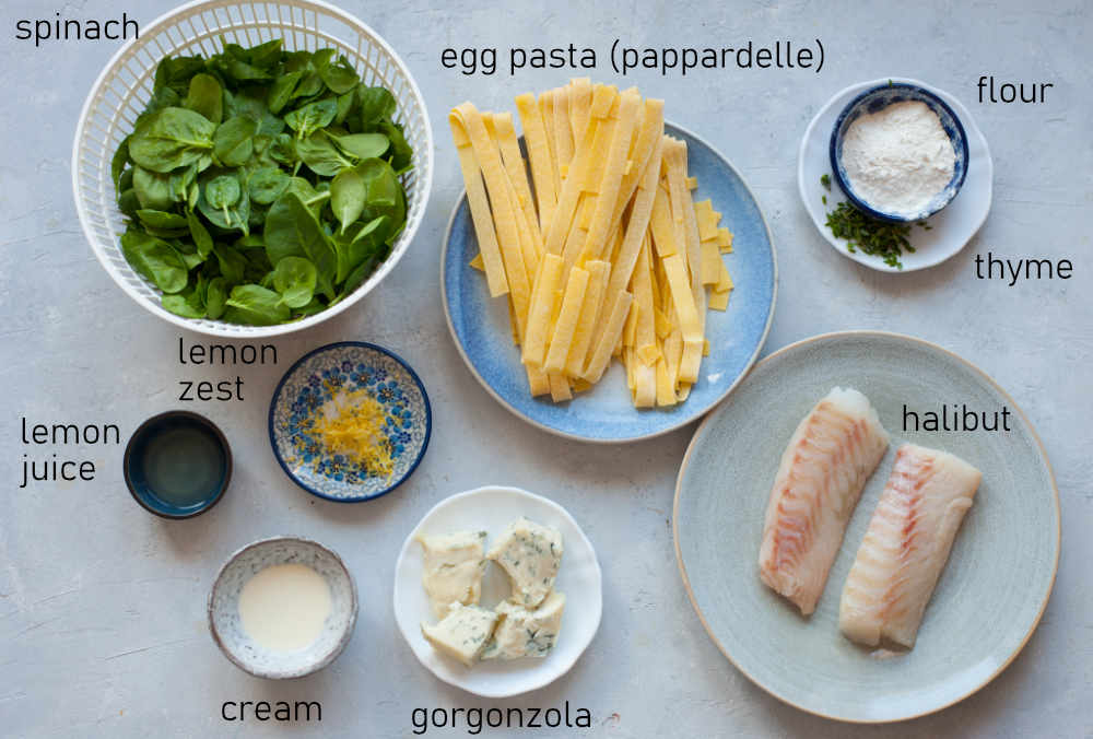 Labeled ingredients for spinach gorgonzola pasta with fish.