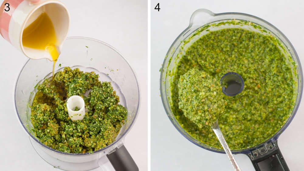 Olive oil is being added to the food processor bowl. Arugula pesto on a spoon, food processor in the background.