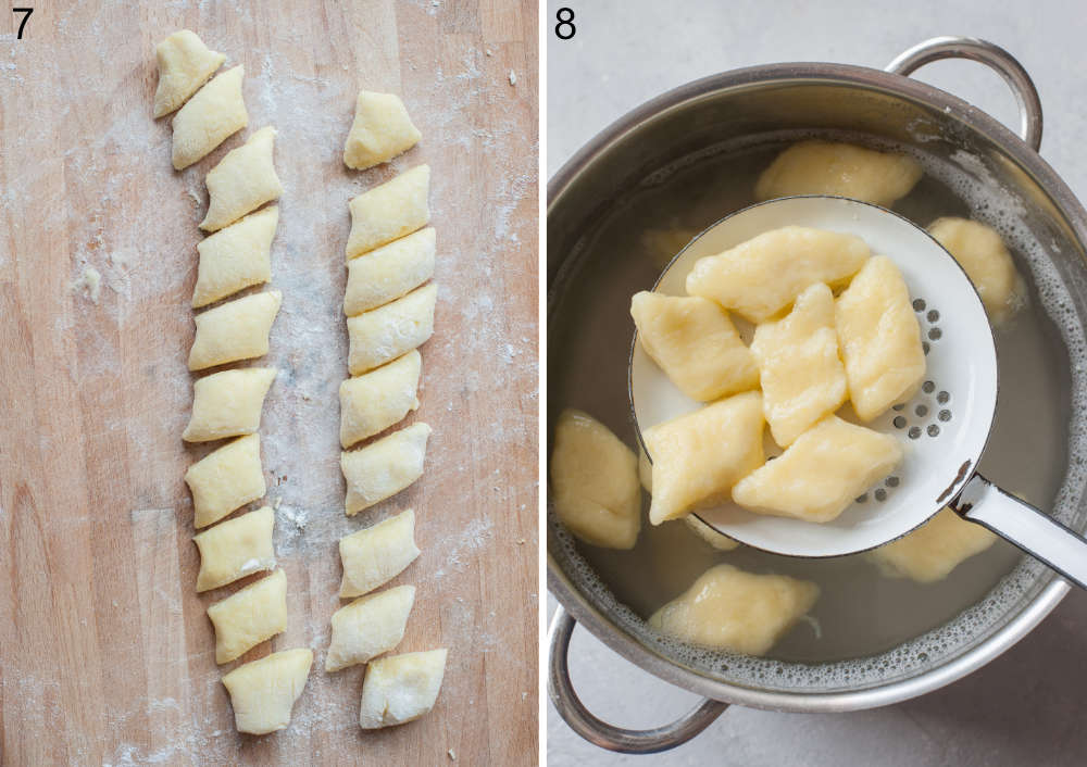 Uncooked kopytka dumplings on a wooden board. Kopytka taken from a pot on a slotted spoon.