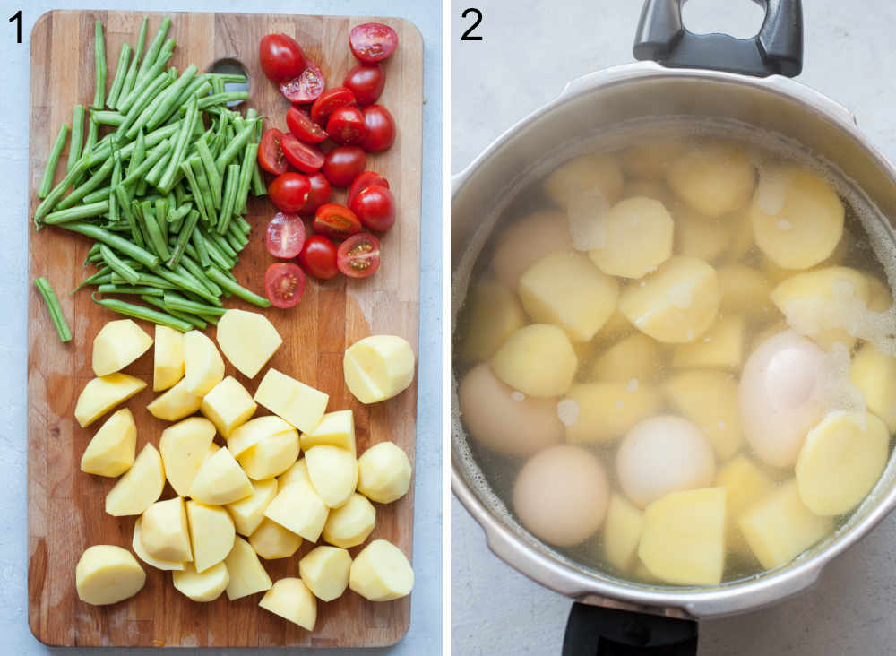 Chopped potatoes, green beans, and cherry tomatoes on a wooden board. Potatoes and eggs in a pot.