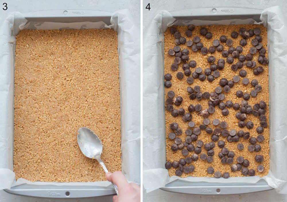 Cookie crust is being pressed with a spoon in a baking pan. Cookie crust and chocolate chips in a baking pan.